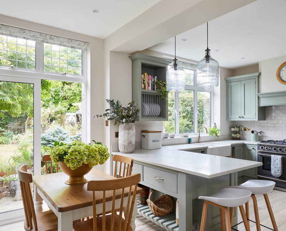 A beautifully handmade kitchen with exposed brick and solid timber in surbiton After