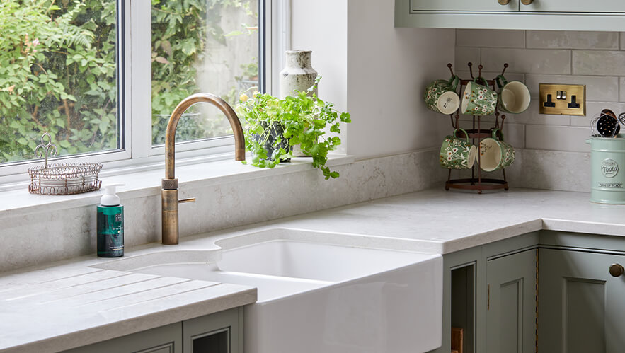 A beautifully handmade kitchen with exposed brick and solid timber in surbiton