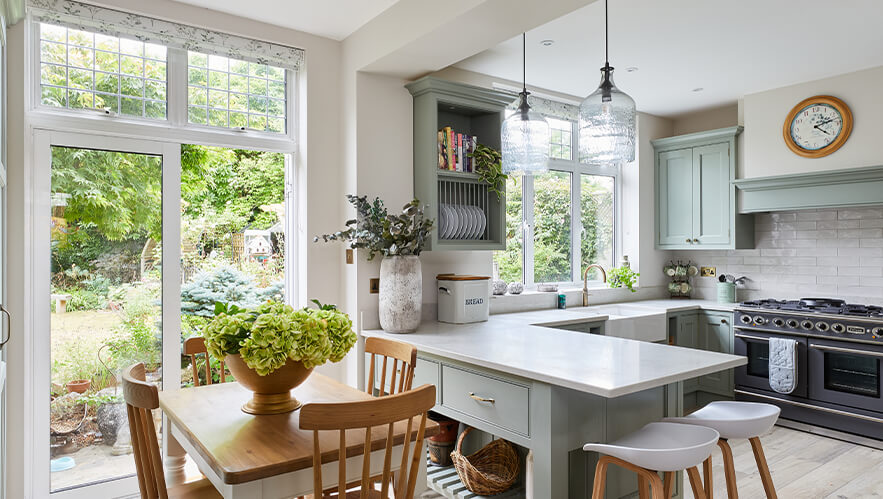 A beautifully handmade kitchen with exposed brick and solid timber in surbiton