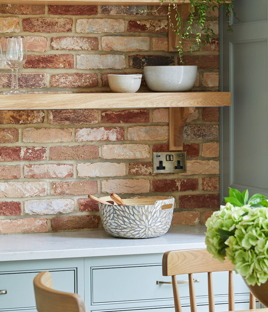 A beautifully handmade kitchen with exposed brick and solid timber in surbiton