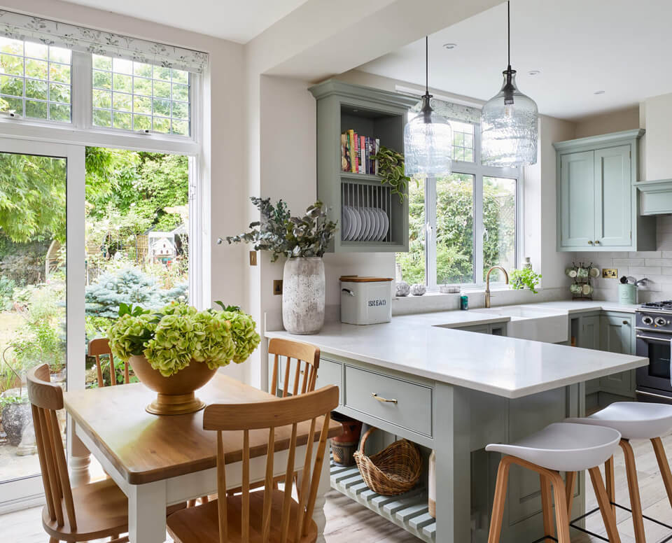 A beautifully handmade kitchen with exposed brick and solid timber in surbiton real