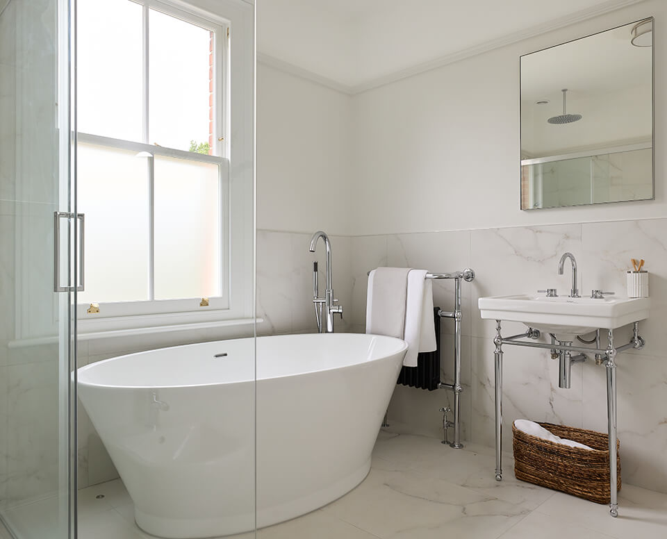 Classical Calacatta Family bathroom in Surbiton real