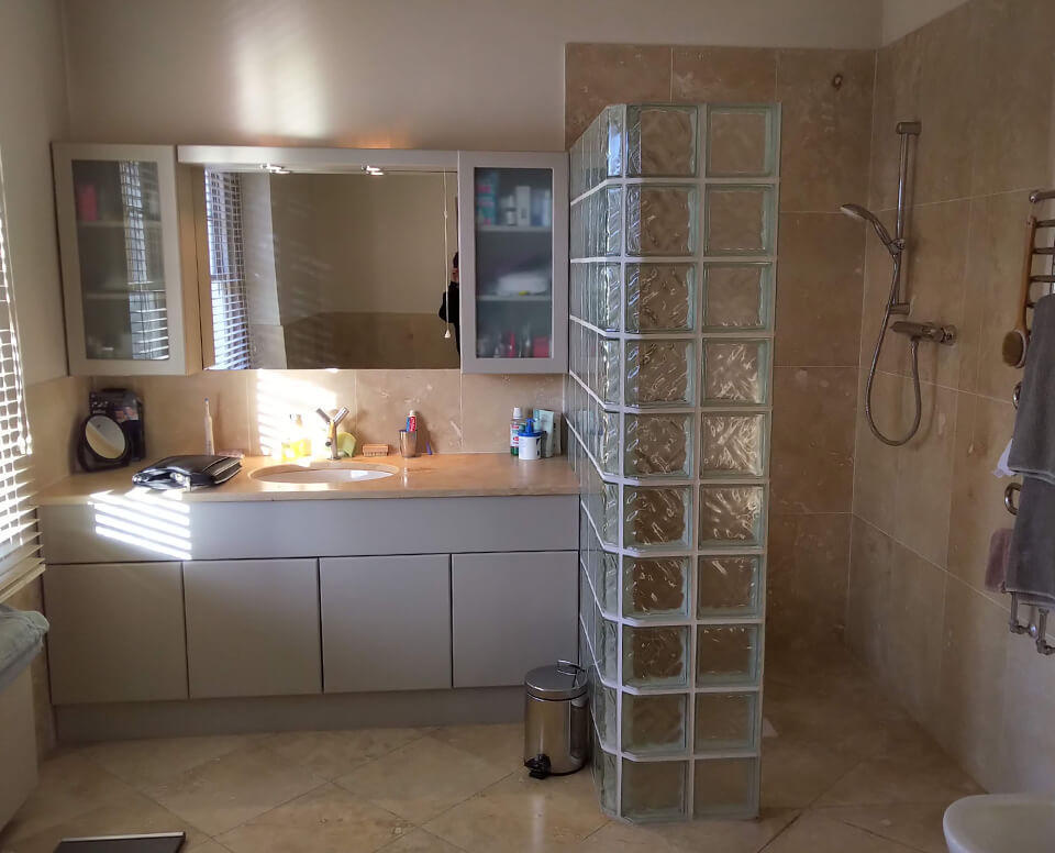 Colourful family wetroom in east molesey Before