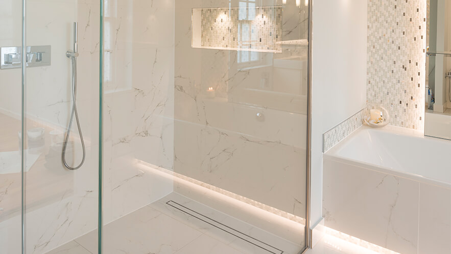 Beautiful Marble master bathroom in esher