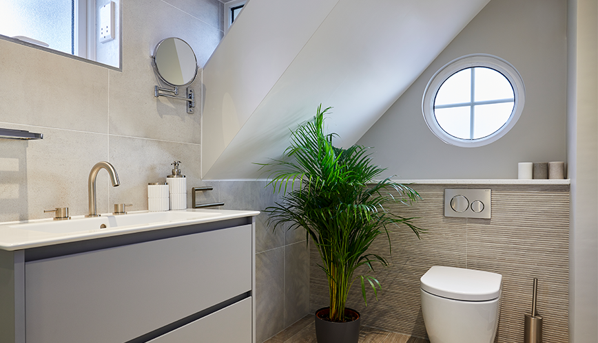 unconventional shaped en suite in thames ditton