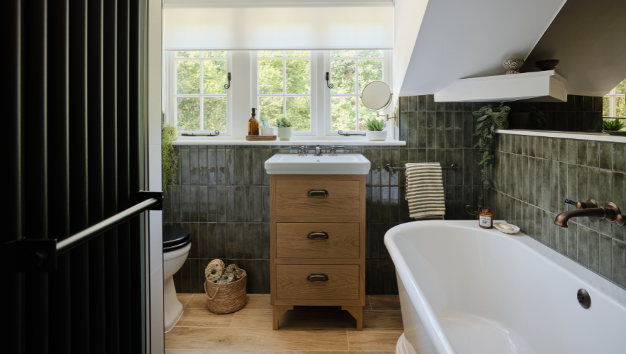 Rugged alligator iridescent tiles paired with natural materials creates warmth for this family bathroom in a Grade II listed home in Great Bookham.
